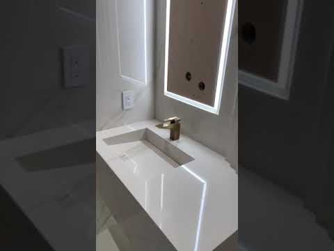 Laminam Calacatta Oro Venato Polished Porcelain Powder Room - Porcelain Integrated Sinks