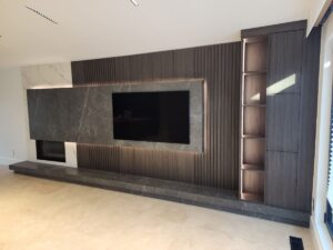 Dark Gray Porcelain Slap TV Fireplace and Hearth Living Area